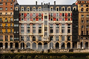 Modernist urban facade in Nervion Bilbao river photo