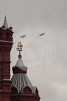 Modernized front-line bombers with a variable sweep wing Su-24M in the sky over Moscow`s Red Square during the Victory Air Parade