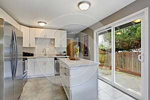 Modernized kitchen with grey and white theme.