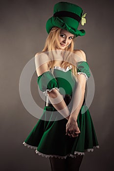 Modest girl in green dress in image leprechaun