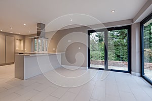 Modewrn kitchen with bifold doors