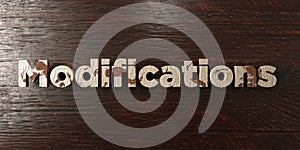 Modifications - grungy wooden headline on Maple - 3D rendered royalty free stock image