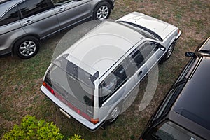 Modified white Honda Civic Wonder SB3 hatchback on parking lot