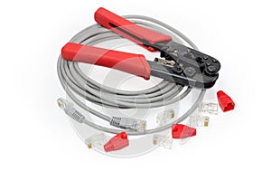 Modular crimper tool and networking components on a white background