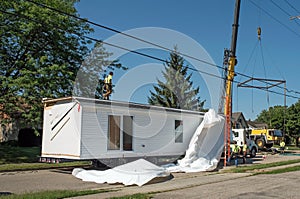 Modular Home Covering Being Removed photo