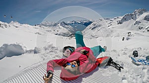 Moelltaler Gletscher - A girl lying on the snow