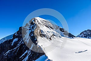 Moench mountain - View of the mountain Moench in the Bernese Alps in Switzerland - travel destination in Europe