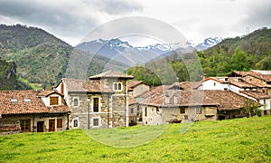 Mogrovejo Village in front of the Picos de Europa, Cantabria, Sp photo