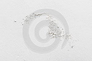 Moisture damaged white wall photo