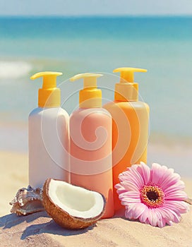 Moisturizing oils and lotions for tanning on a beach against the sea