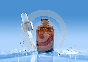 Moisturizing serum with pipette on the top stands on the blue water background