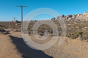 Mojave desert south of Las Vegas, Nevada including telephone and electric poles.