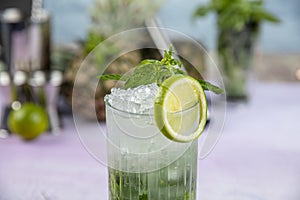 Mojito cocktail alcohol bar long drink traditional Cuba fresh tropical beverage top view copy space two highball glass, with rum,