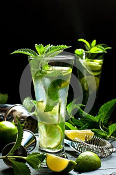 Mojito cocktail in  glass on  dark table