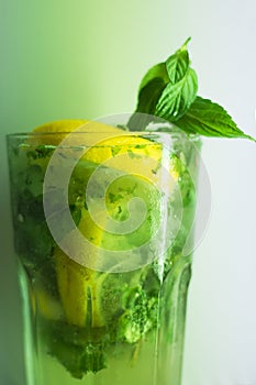 Mojito cocktail in glass,fresh drink, ready to drink, mint, lemon and lime with alcohol and ice cubes