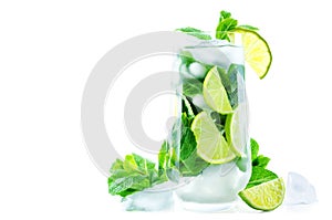 Mojito coctail with fresh mint leaves and lime slice