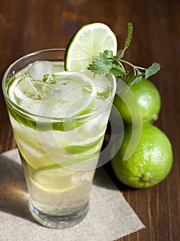 Mojito with fruit lime and ice.