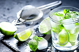 Mojito in glass on dark background close up