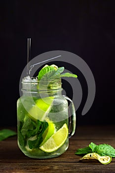 Mojito in a glass jar on darck background