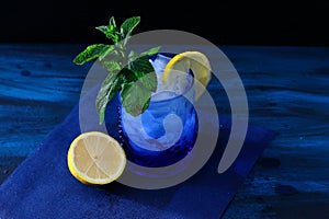 Mojito with lemon and good herb, refreshing drink photo