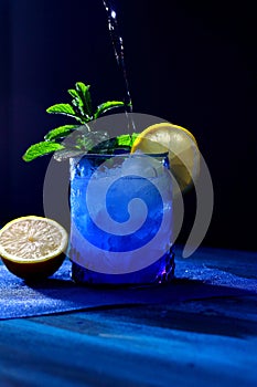 Mojito with lemon and good herb, refreshing drink photo