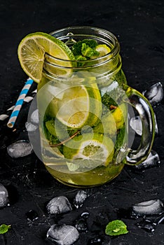 Mojito with lime in a mason jar