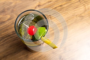 Tropical cocktails on wooden background. Frutal alcoholic cocktails. Colorful drinks concept photo