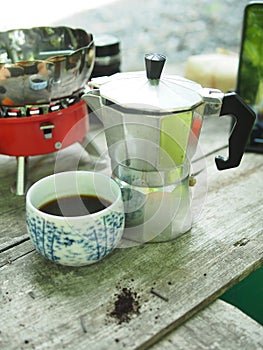 Moka pot coffee maker home drink small and good feel in garden and wooden table