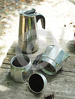 Moka pot coffee maker home drink small and good feel in garden and wooden table