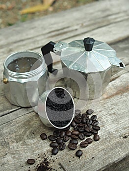 Moka pot coffee maker home drink small and good feel in garden and wooden table