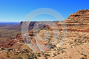 Moki Dugway road leads out of the Valley of the Gods to Muley Point which overlooks Monument Valley, Mexican Hat and the