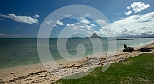 Mokolii island also known as Chinamans Hat as seen from Kualoa Regional Park on the North Shore of Oahu Hawaii USA