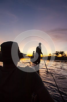 Mokoro Poler in Okavango Delta, Botswana