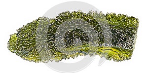 Moldavite detail. Green semiprecious stone of alien origin isolated on white background