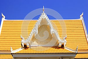 Molding art on pediment of Thai temple