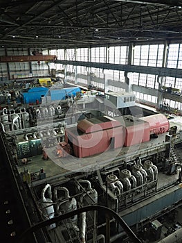 28.01.2020, Moldova, Chisinau: Power generator steam turbine in repair process, machinery, pipes, tubes at power plant