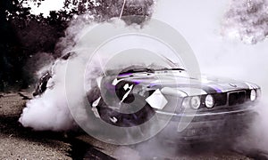 Moldova 25.09.2019. Sport modern Stance E34 BMW Car racing car drifting with smoke drift burnout, big clouds with