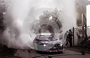 Moldova 25.09.2019. Sport modern Stance E30 BMW Car racing car drifting with smoke drift burnout, big clouds with