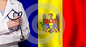 Moldovan medicine and healthcare concept. Doctor close up against flag of Moldova background
