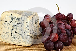 Moldy cheese and red grapes