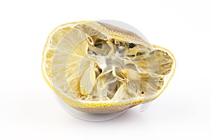 Moldy lemon on white background