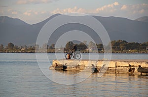 Mole in the bay of Nafplio, at sunset. Peloponnese, Greece.