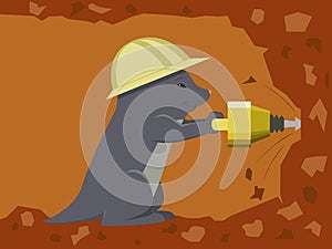 Mole builder is digging a tunnel with jackhammer photo