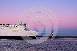 Mole and ferryboat on shore of the Baltic Sea in Warnemuende, Germany