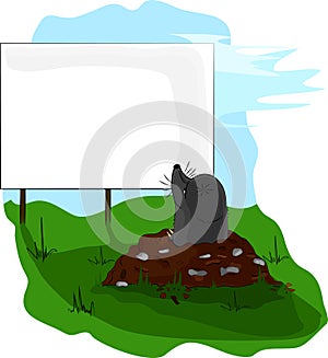 Mole on molehill looking at a billboard.