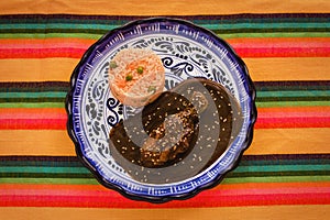 Mole Poblano with Chicken and rice is Mexican Food in Puebla Mexico photo