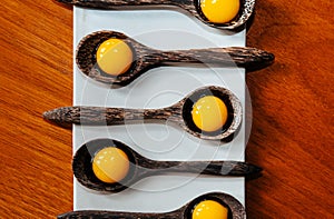 Molecular gastronomy creativity modern cuisine, Jelly dessert in wooden spoons on white plate