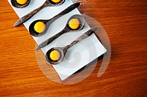 Molecular gastronomy creativity modern cuisine, Jelly dessert in wooden spoons on white plate