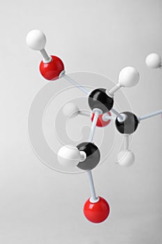 Molecule of glucose on light grey, closeup. Chemical model