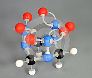 Molecule model of C4 explosive. Cyclonite White is Hydrogen, black is Carbon, red is  Oxygen,  White is Hydrogen, black is